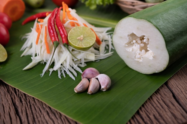 Som Tam Thai -Ingredients Papaya Salad Thai Food Style on wooden table. Thai Food Concept.