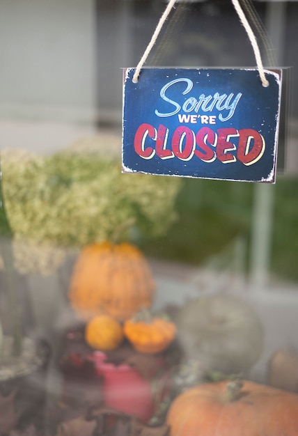 Sorry we're closed sign hanging