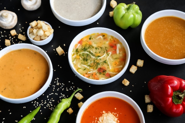 Soup set mushroom lentil pumpkin tomato chicken side view