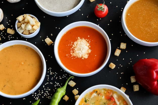 Soup set mushroom lentil pumpkin tomato chicken top view