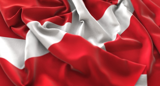 Free photo sovereign military order of malta flag ruffled beautifully waving macro close-up shot