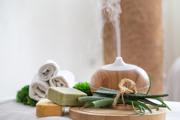 Spa composition with aromatherapy and body care items.