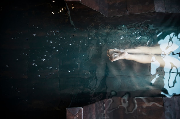 Free Photo spa concept with woman relaxing in water