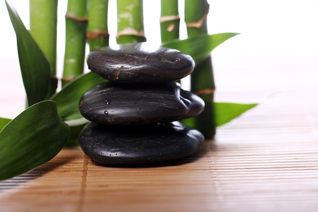 Spa stones and bamboo leaves