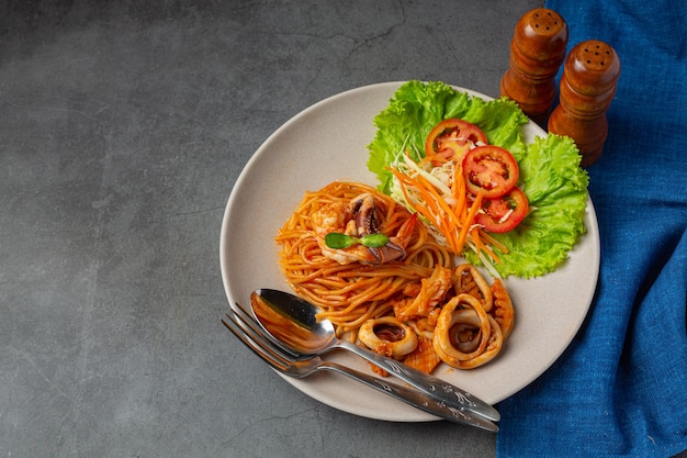 Spaghetti Seafood with Tomato Sauce Decorated with beautiful ingredients.