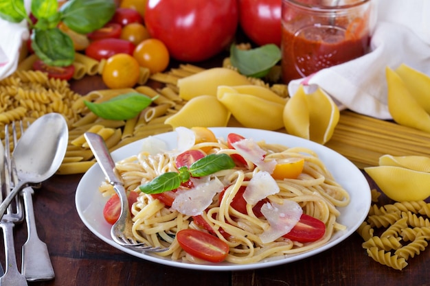 Spaghetti with cherry tomatoes basil and parmesan