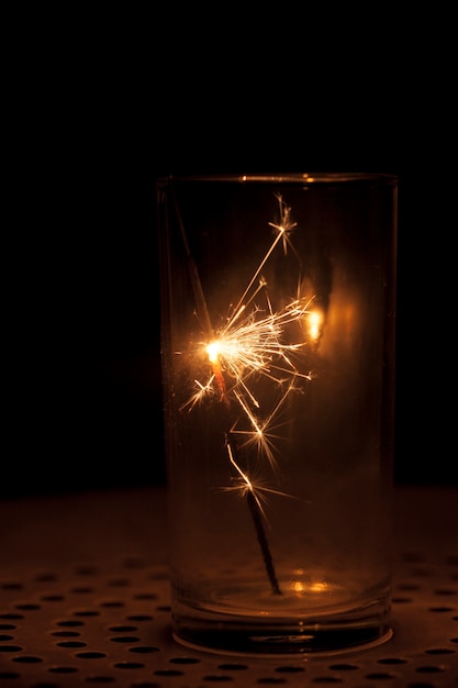 Free photo sparkler in a glass