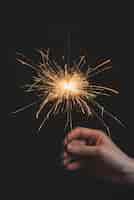 Free photo sparkler in hand