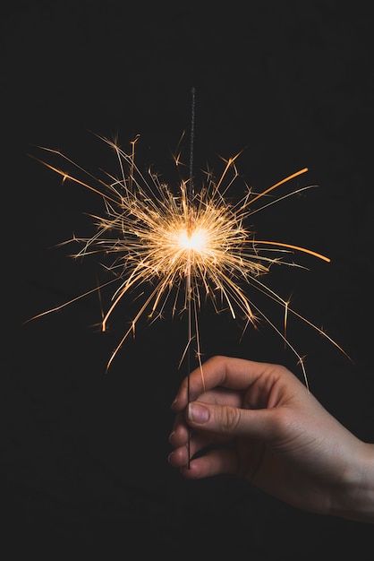 Free Photo sparkler in hand