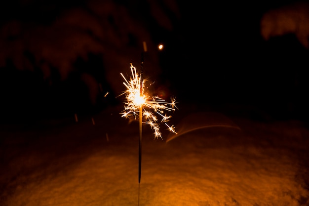 Free Photo sparkler in the snow