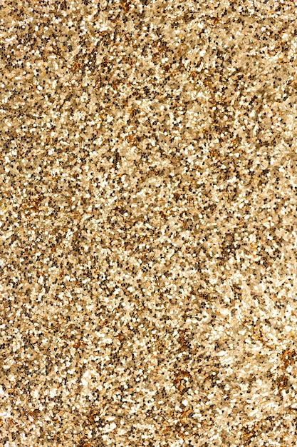 Free photo sparkly gold glitter background texture