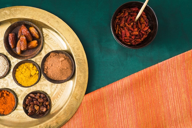 Spices and dry fruits on tray