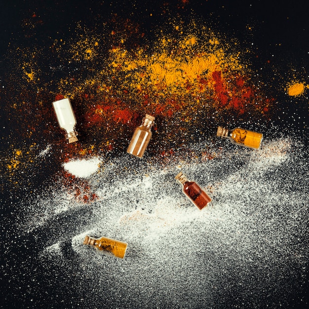 Free photo spices in five bottles