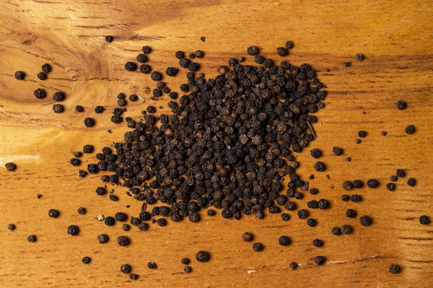 Spices. Heap of pepper on the table