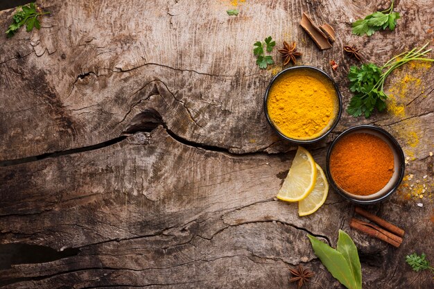 Spices and lemon slices flat lay