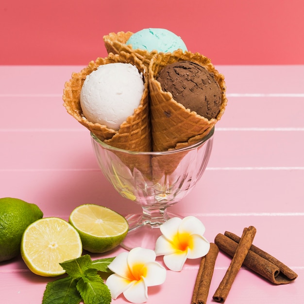 Spices and lime near delicious ice-creams