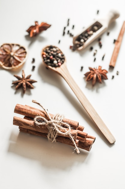 spices in a spoon isolated on white background,