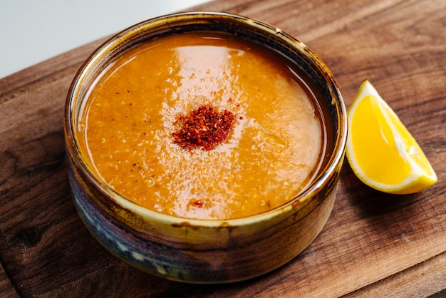 Spicy lentil soup with side lemon