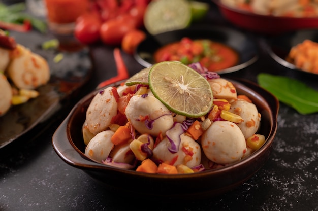 Spicy Meatball Salad with Chili, Lemon, Garlic and Tomato.