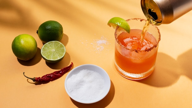 Spicy michelada drink arrangement on the table