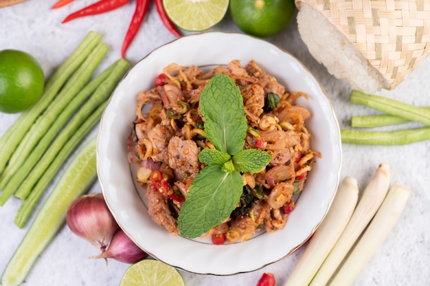 Spicy minced pork in a white plate.