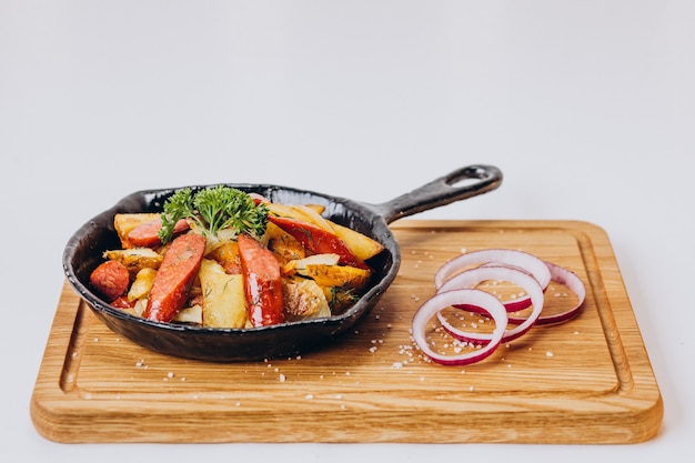 Spicy pork with vegetables in a pan