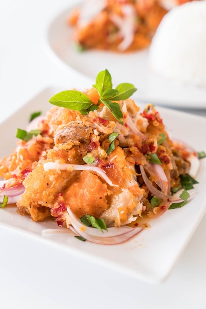 spicy salad with fried chicken