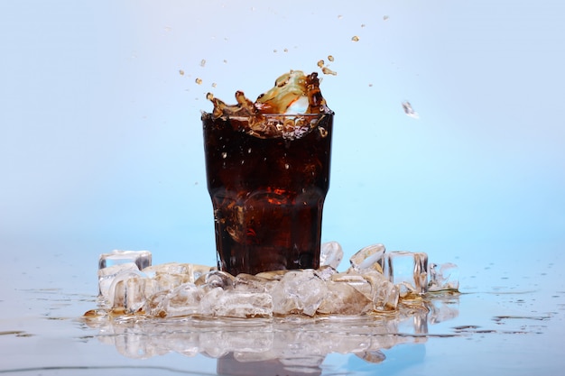 Splashes of cold cola drink