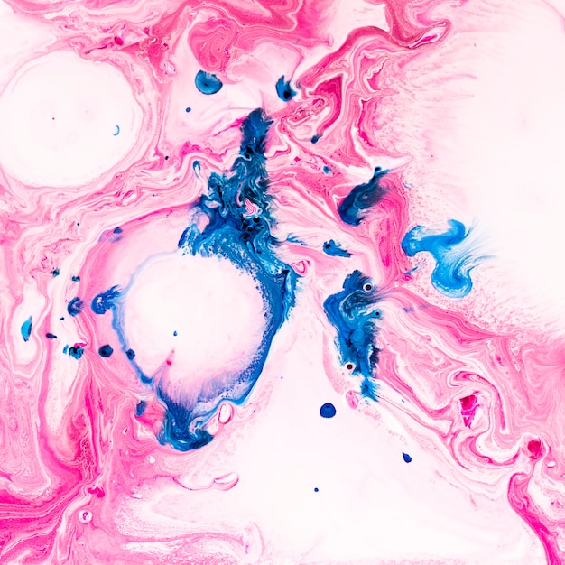 Free photo splashes of paint with colored swirls