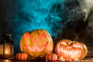 Free photo spooky carved pumpkins for halloween