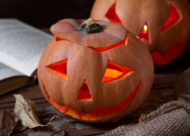 Free Photo spooky halloween carved pumpkin lantern with scary face