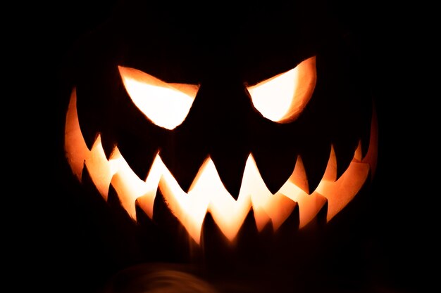 Spooky halloween pumpkin glowing face