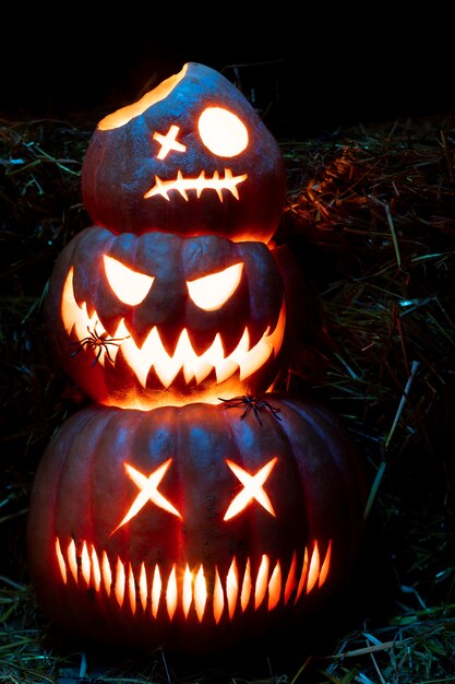 Spooky halloween pumpkin glowing faces