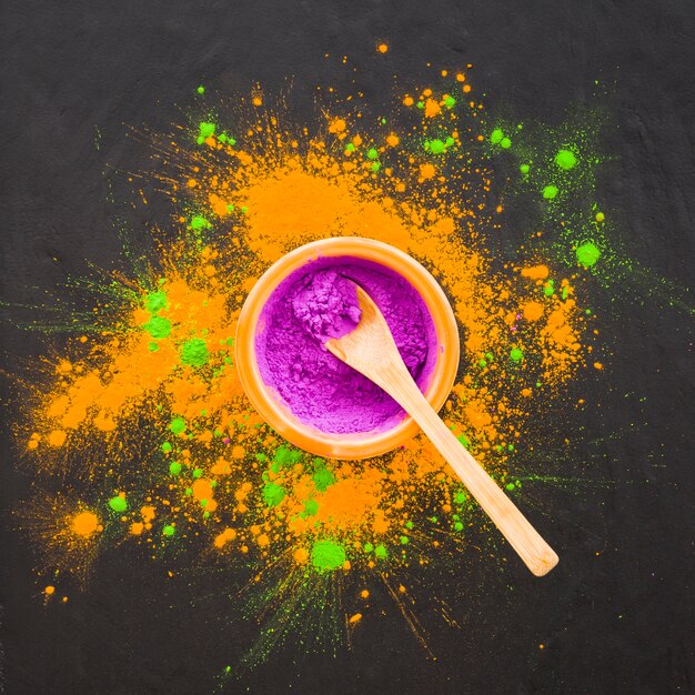 Spoon in bowl with purple powder