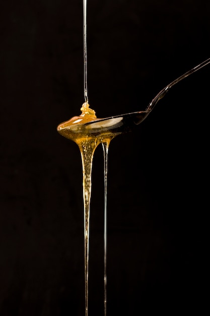 Free photo spoon full of honey