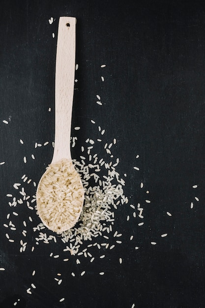 Free photo spoon with milled rice