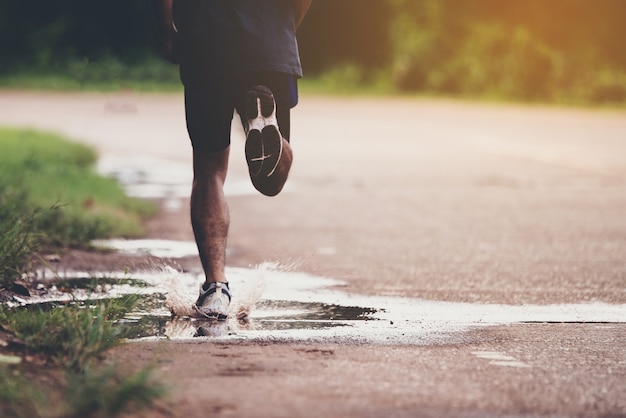 Free photo sport concept, close up the man with runner on the street