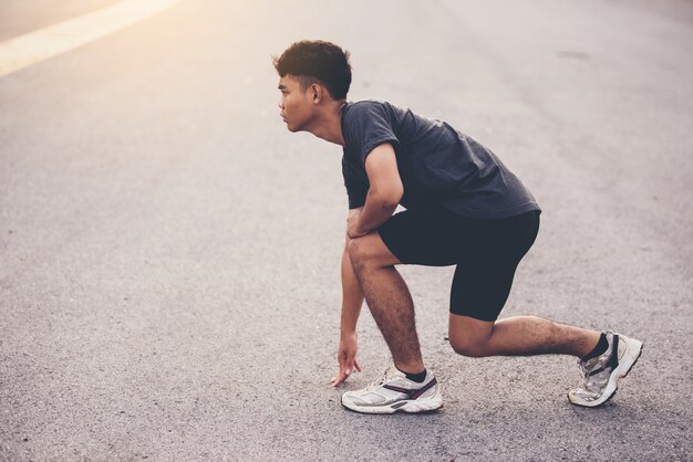 Sport Concept, Close up the man with runner on the street