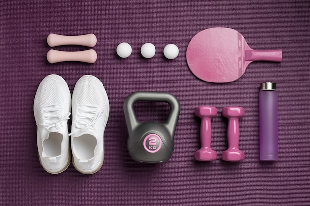 Free photo sport equipment arrangement flat lay