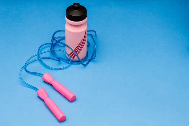 Free photo sports equipment isolated on blue background