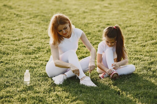 Sports family in a summer park