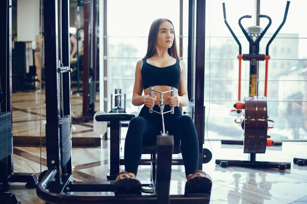 Sports girl in a morning gym