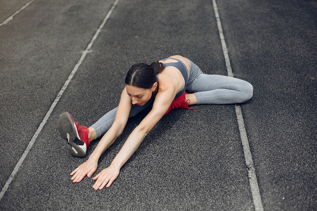 Free photo sports girl training at the stadium