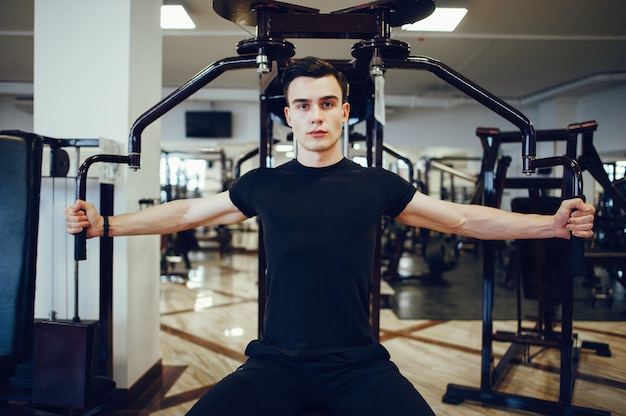 Sports man in a morning gym