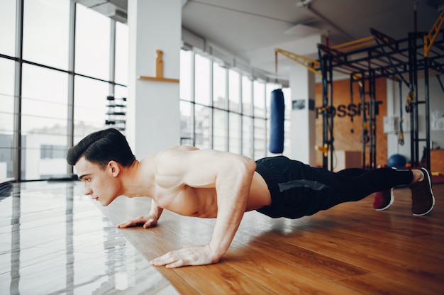 Sports man in a morning gym