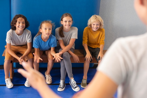 Sports teacher with her students