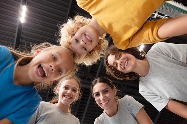 Sports teacher with her students