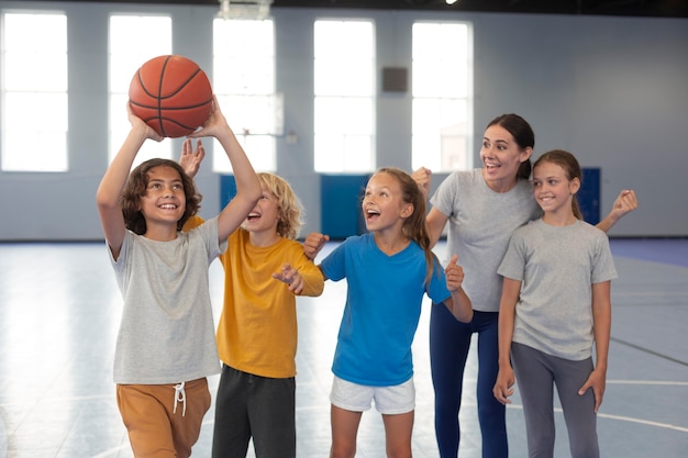 Sports teacher with her students