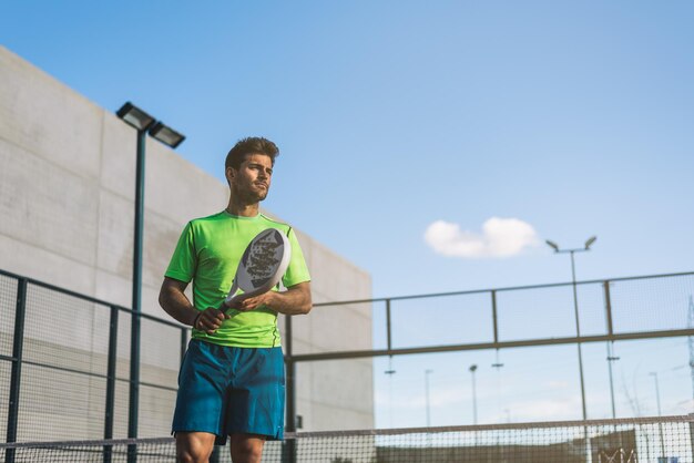 Sportsman playing padel game