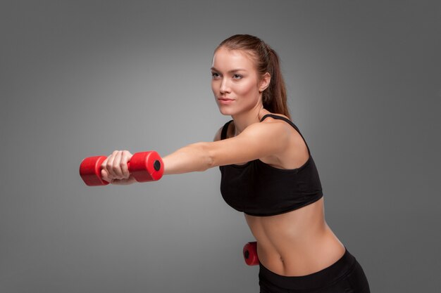 Sporty woman doing aerobic exercise